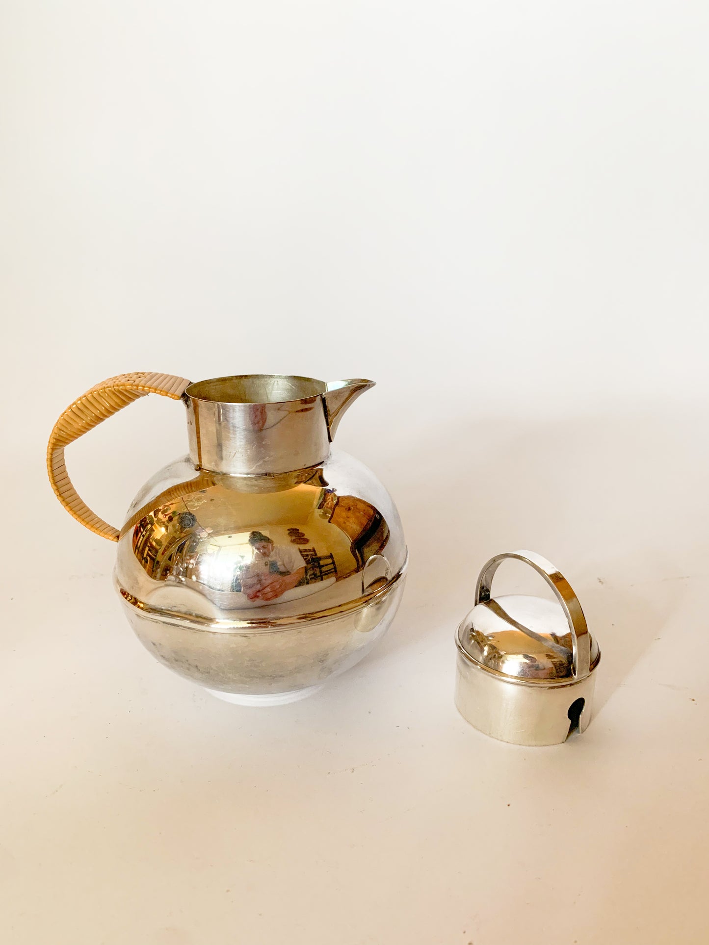 1930s Silver Plate and rattan creamer pitchers