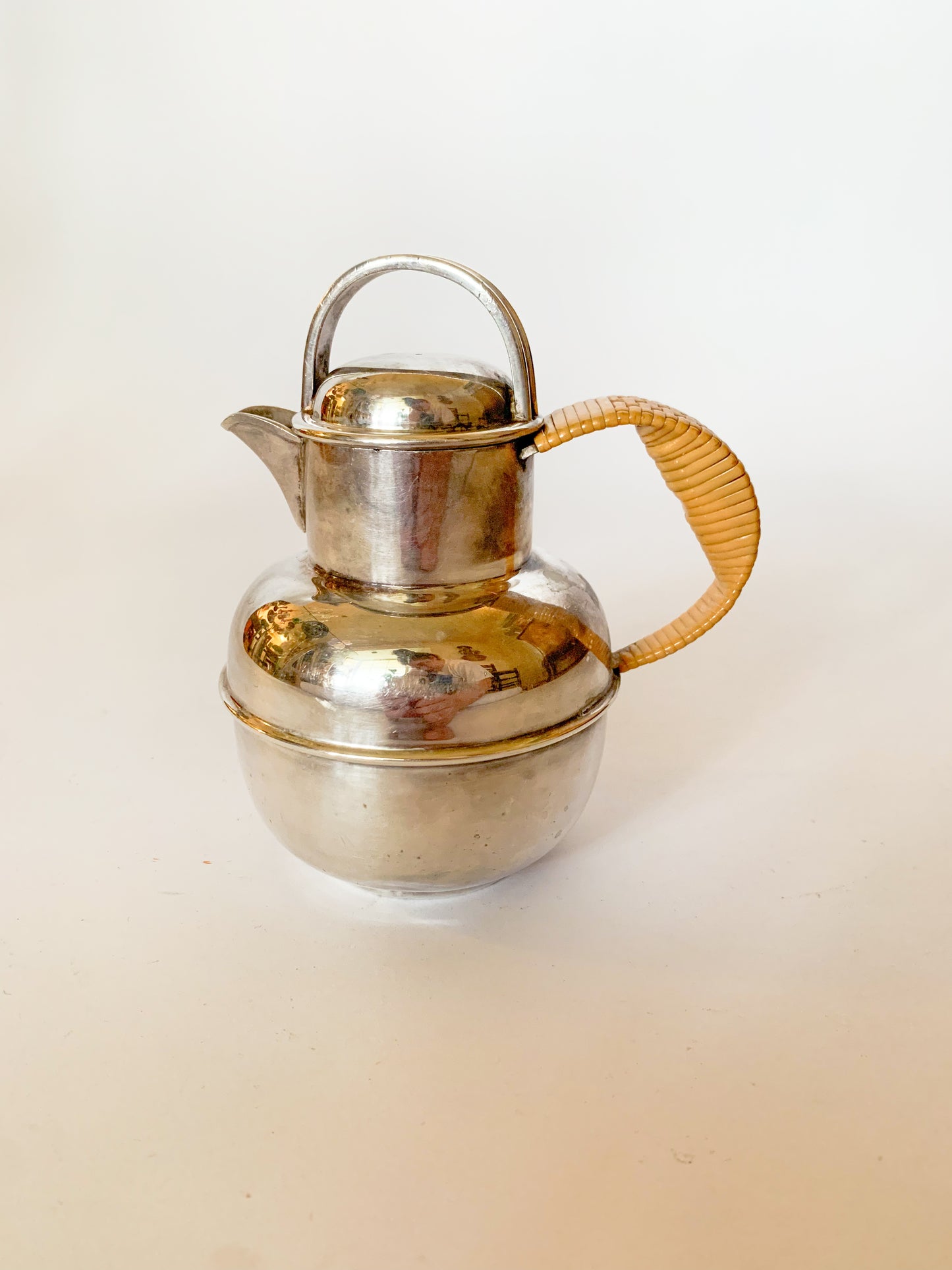 1930s Silver Plate and rattan creamer pitchers