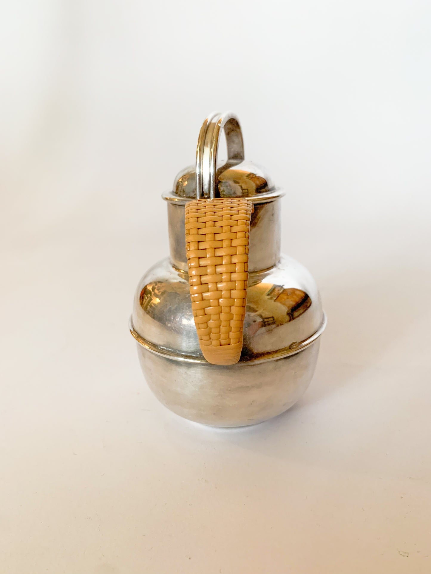 1930s Silver Plate and rattan creamer pitchers