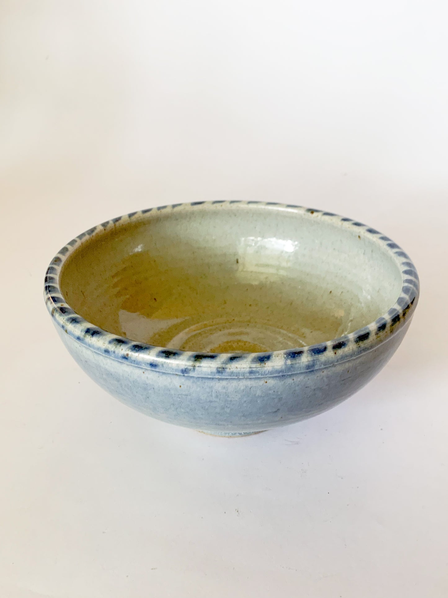 Studio Pottery Bowl with blue dash design on rim